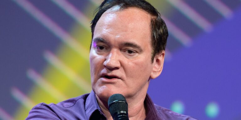quentin-tarantino-holding-a-microphone.jpg